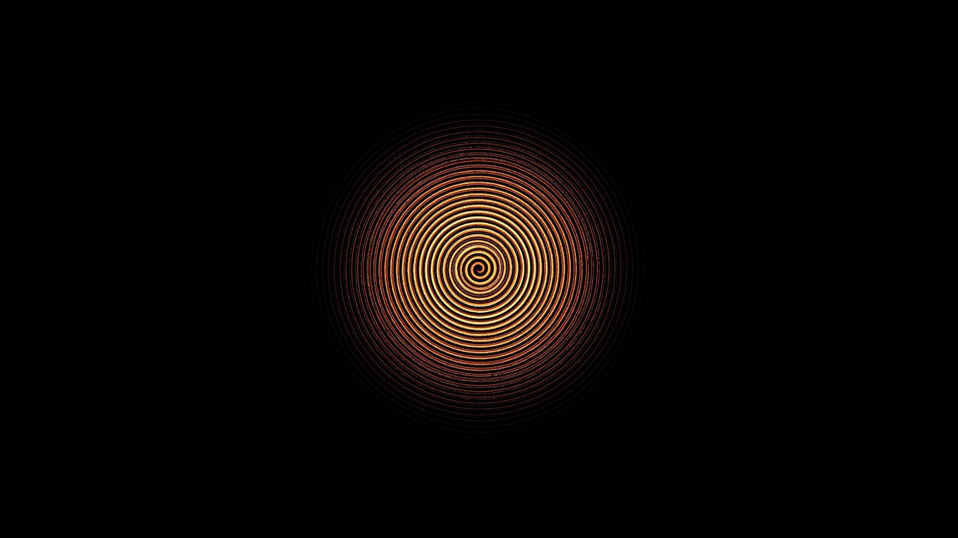 Goldene Spirale auf schwarzem Hintergrund.
